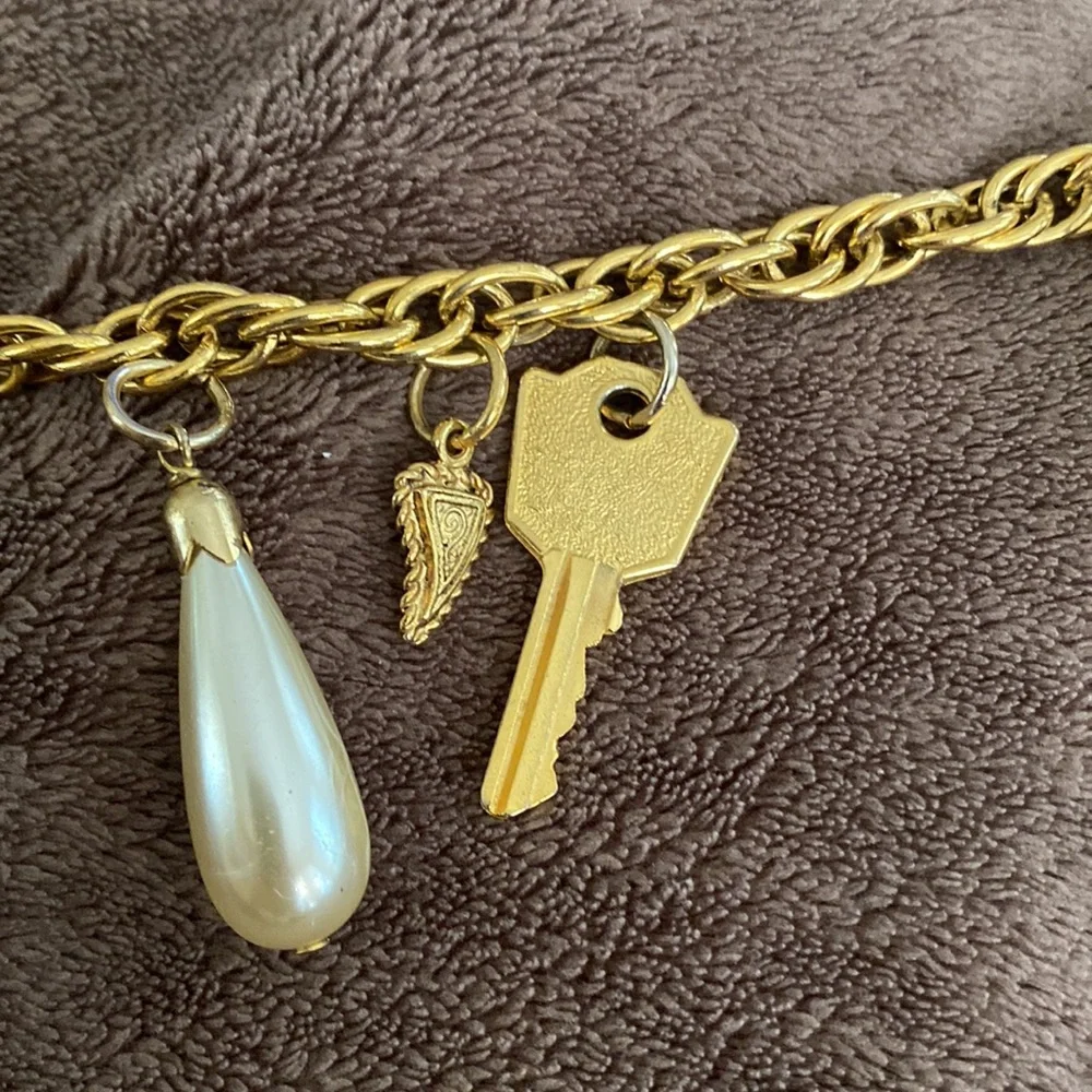 Vintage 1980s Rare Moschino Redwall 15 iconic brand gold charm necklace